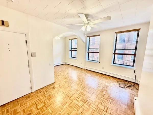 an empty room with windows