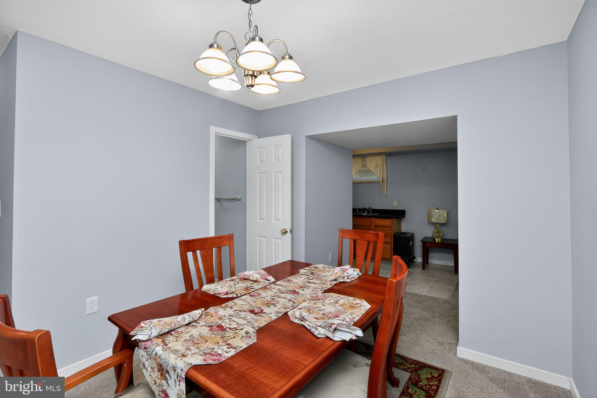 330 Powder Horn Drive Ruther Glen, VA 22546 - Photo 13 of 26 Multi-purpose room staged as dining space