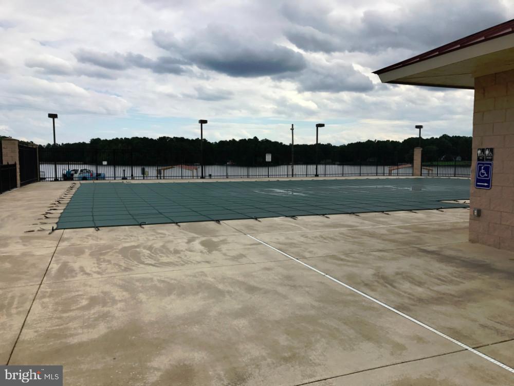 330 Powder Horn Drive Ruther Glen, VA 22546 - Photo 23 of 26 Community pool overlooking scenic lake views