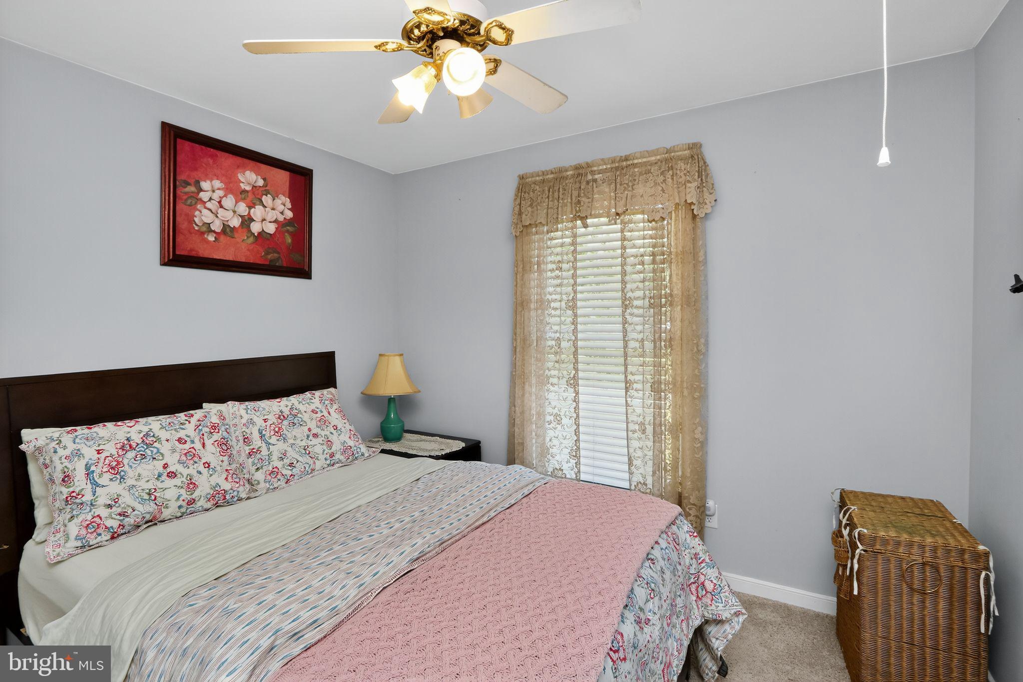 330 Powder Horn Drive Ruther Glen, VA 22546 - Photo 9 of 26 Charming bedroom with plush carpet for comfort