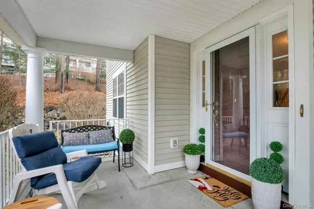 a outdoor living space with furniture and potted plants