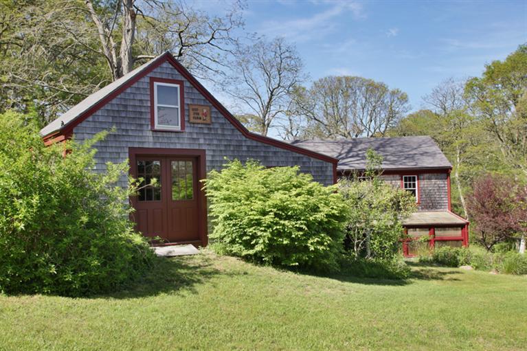 16 Ridgewood Road Orleans, MA 02653 - Photo 7 of 28 a front view of a house with garden