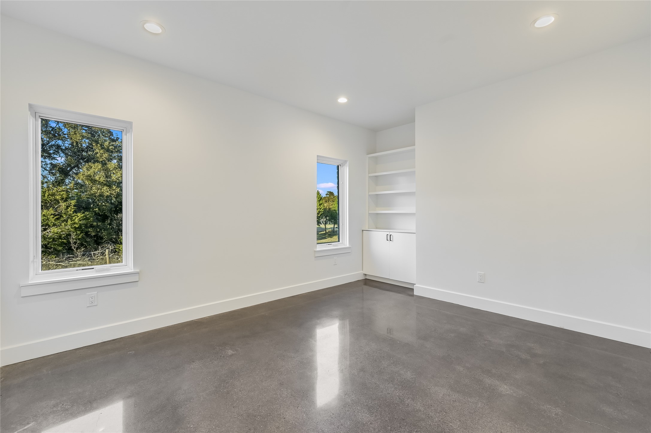 321 Tulley Court Wimberley, TX 78676 - Photo 20 of 29 an empty room with windows