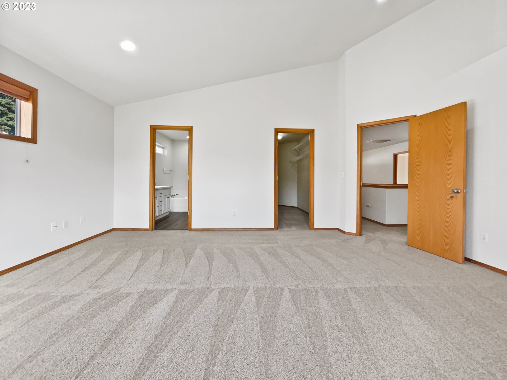 170 Southwest Sandlewood Loop Gresham, OR 97030 - Photo 3 of 19 a view of an empty room with a window