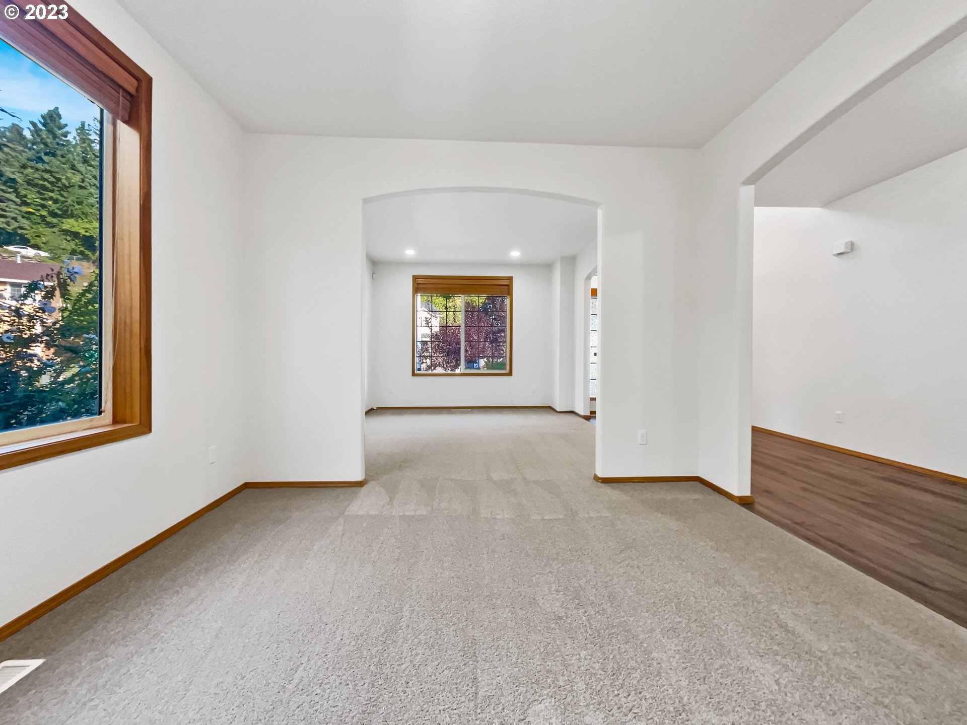 170 Southwest Sandlewood Loop Gresham, OR 97030 - Photo 7 of 19 an empty room with windows and closet