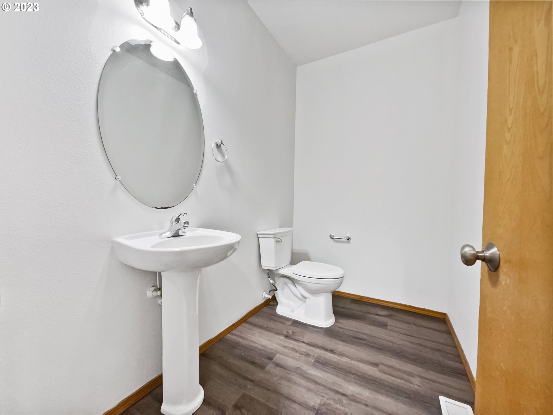 170 Southwest Sandlewood Loop Gresham, OR 97030 - Photo 10 of 19 a bathroom with a sink a mirror and toilet