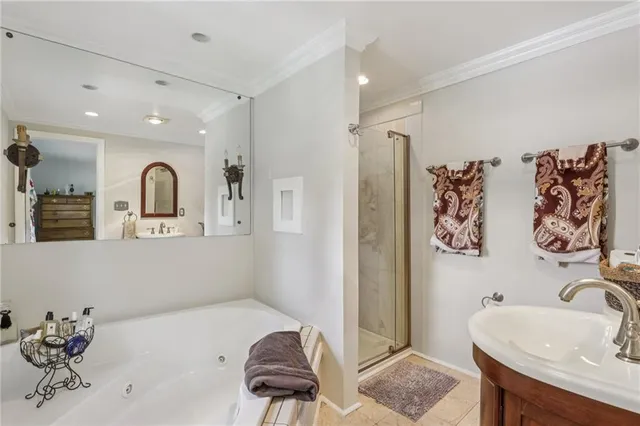 a view of a bathroom with a sink and a mirror