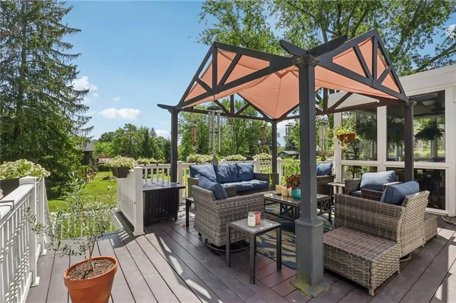 a outdoor living space with furniture and garden view