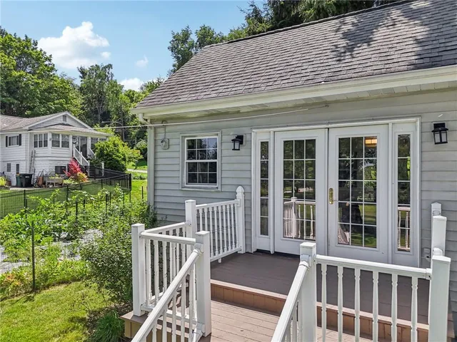 a front view of a house with a porch