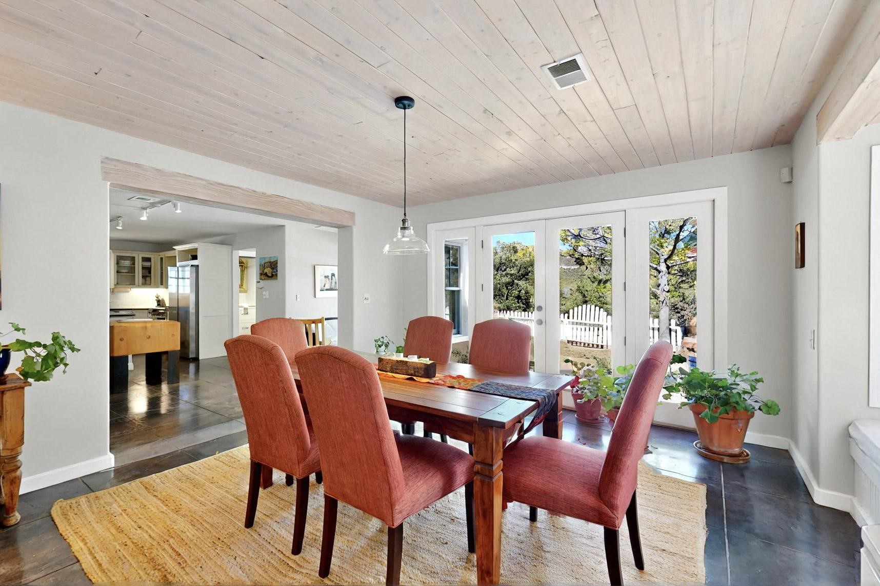 15 Toltec Road Santa Fe, NM 87505 - Photo 14 of 72 Dine in front of the wide French doors