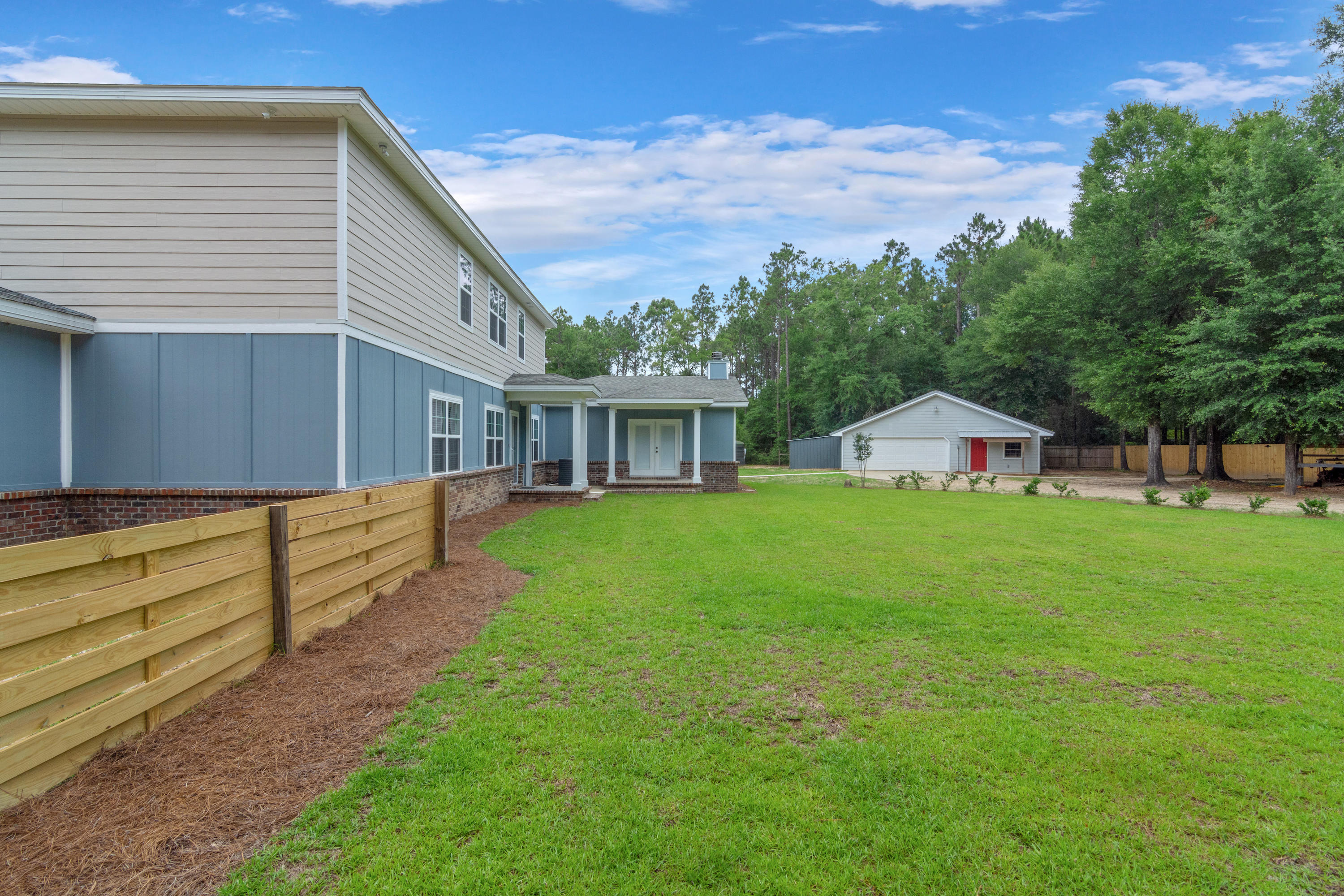 5311 Richard Road Baker, FL 32531 - Photo 54 of 54 a front view of house with yard and seating area