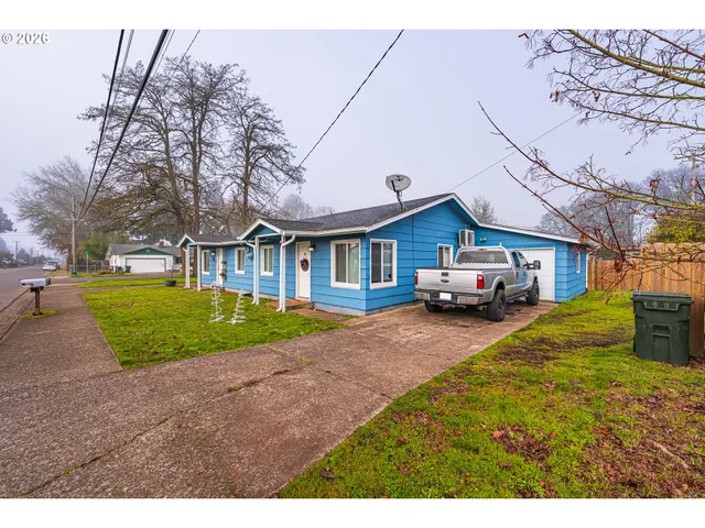 a house view with a garden space