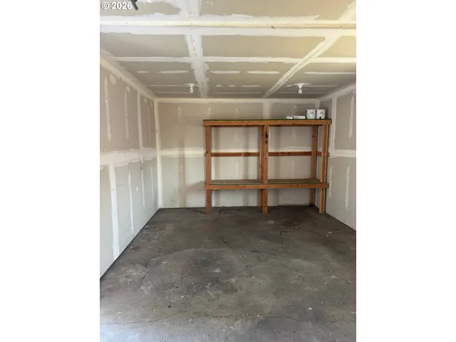 a view of a room with racks on the wall