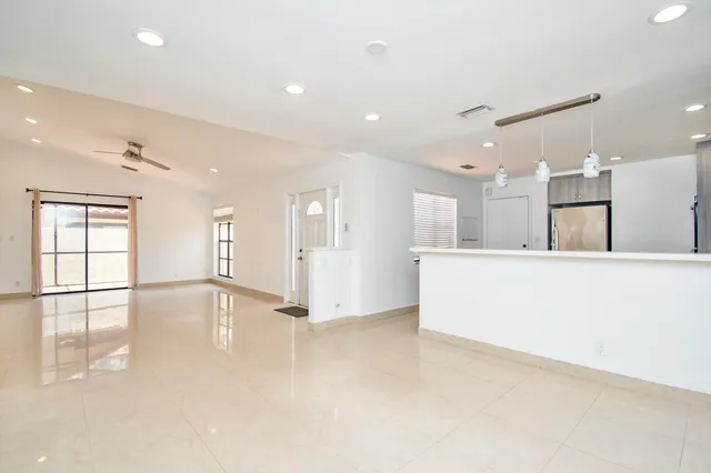 a view of an empty room and window