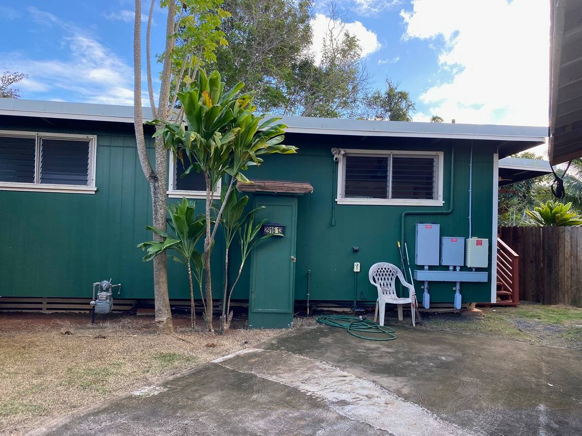 2916 Pala Street, Unit 13 Lihue, HI 96766 - Photo 1 of 11 a view of a house with a backyard