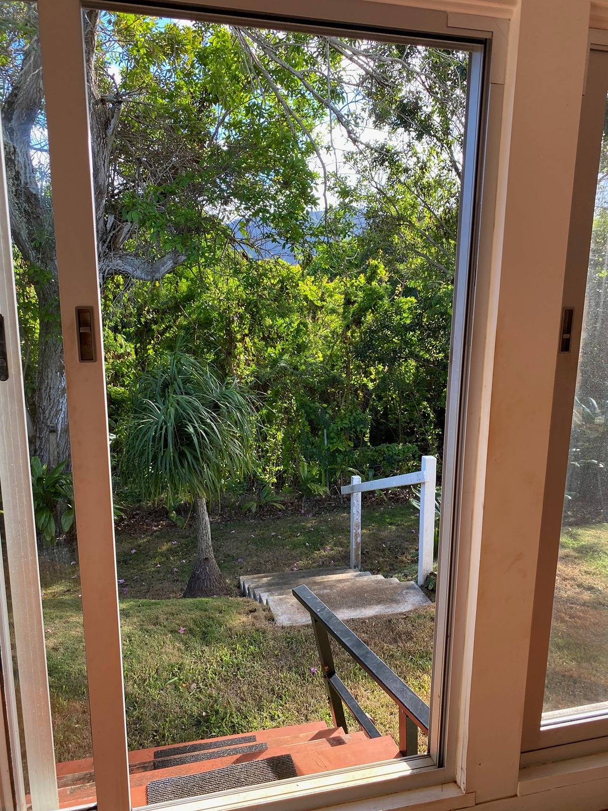 2916 Pala Street, Unit 13 Lihue, HI 96766 - Photo 8 of 11 a backyard of a house with lots of green space