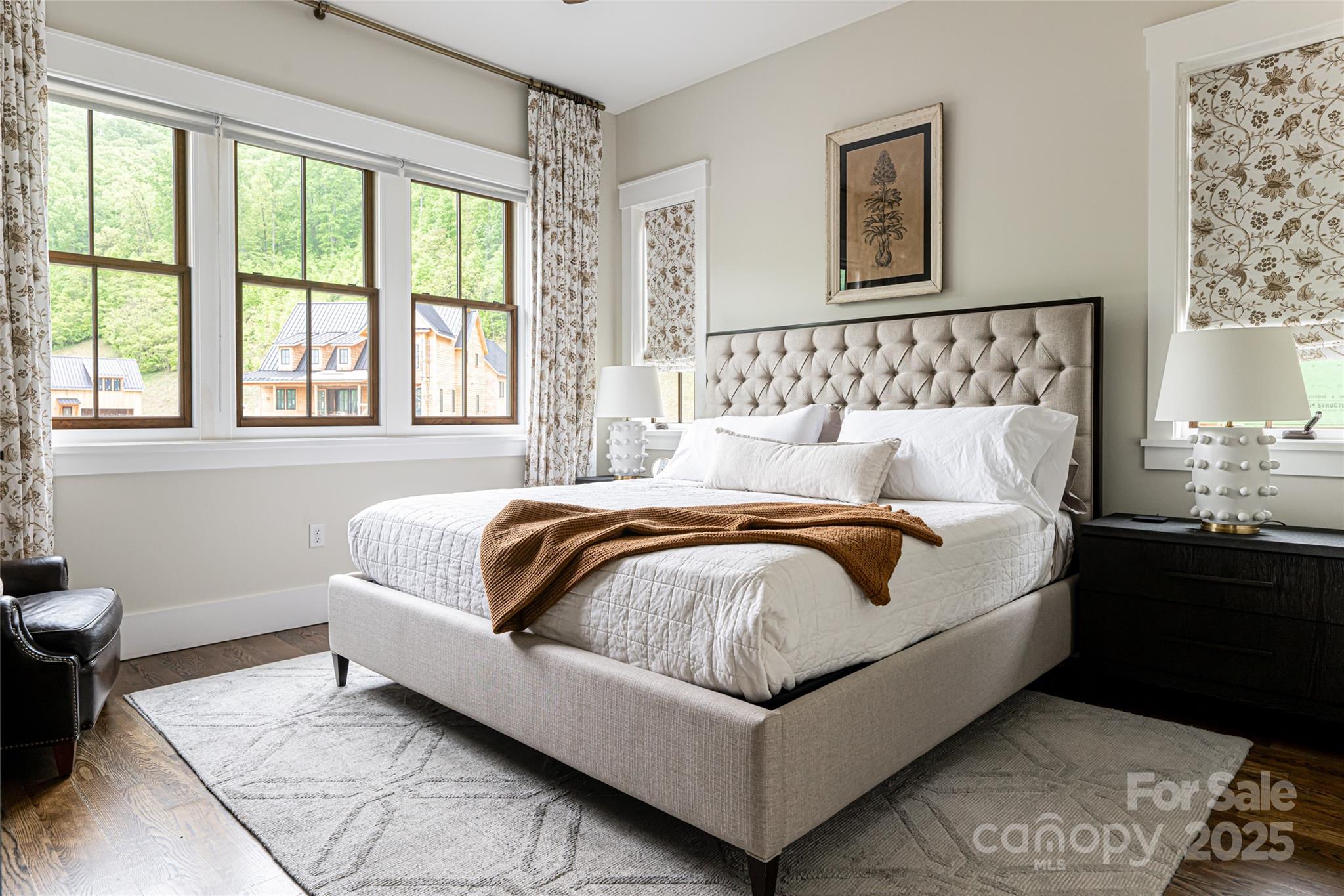 23 ( 1) Lodestone Drive, Unit 412 Sylva, NC 28779 - Photo 11 of 35 a bed sitting in a bedroom next to a window