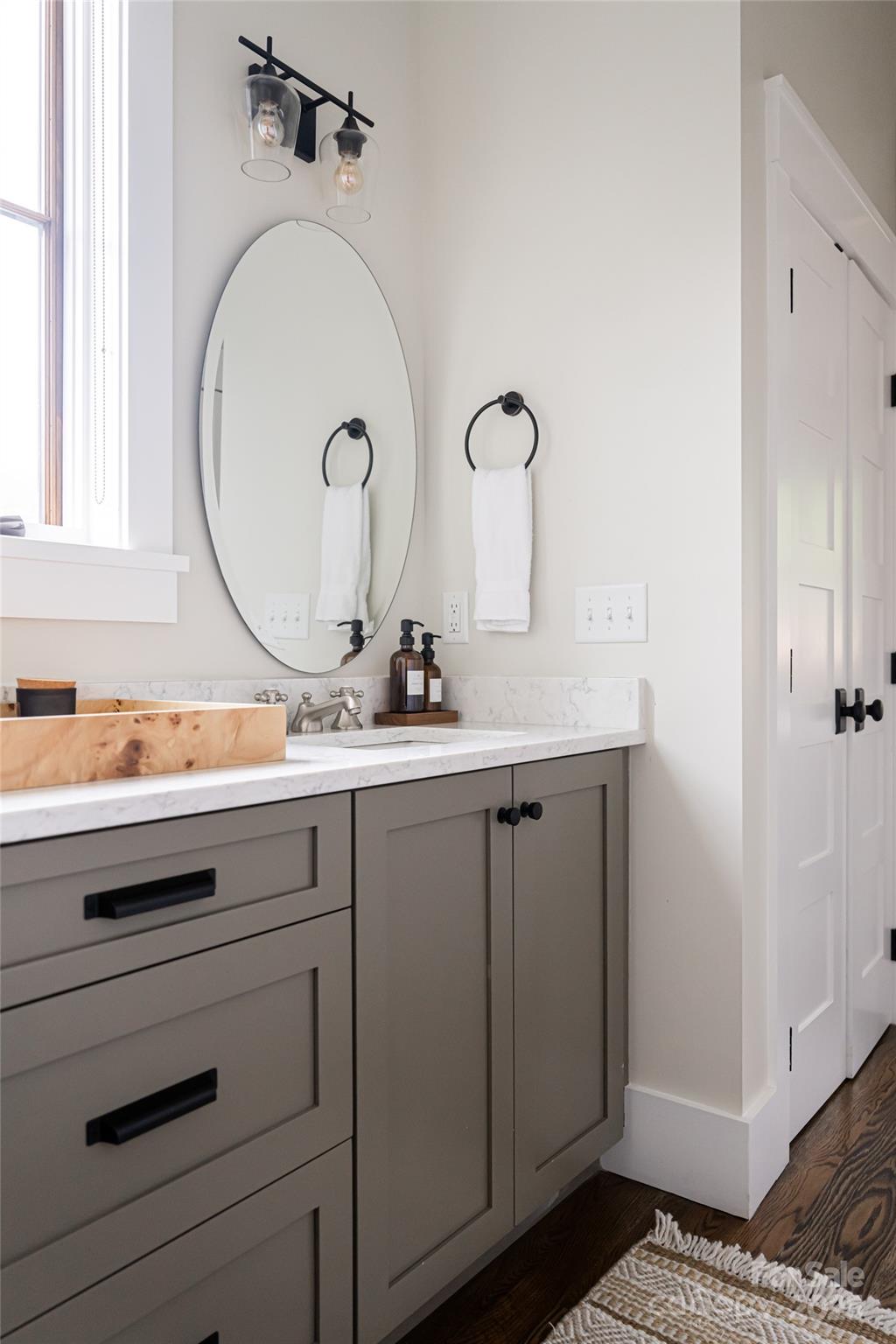 23 ( 1) Lodestone Drive, Unit 412 Sylva, NC 28779 - Photo 15 of 35 a bathroom with a sink and a mirror