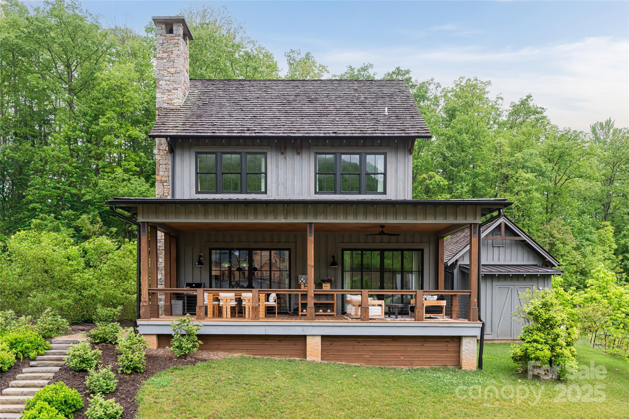 23 ( 1) Lodestone Drive, Unit 412 Sylva, NC 28779 - Photo 2 of 35 a view of house with yard and outdoor seating