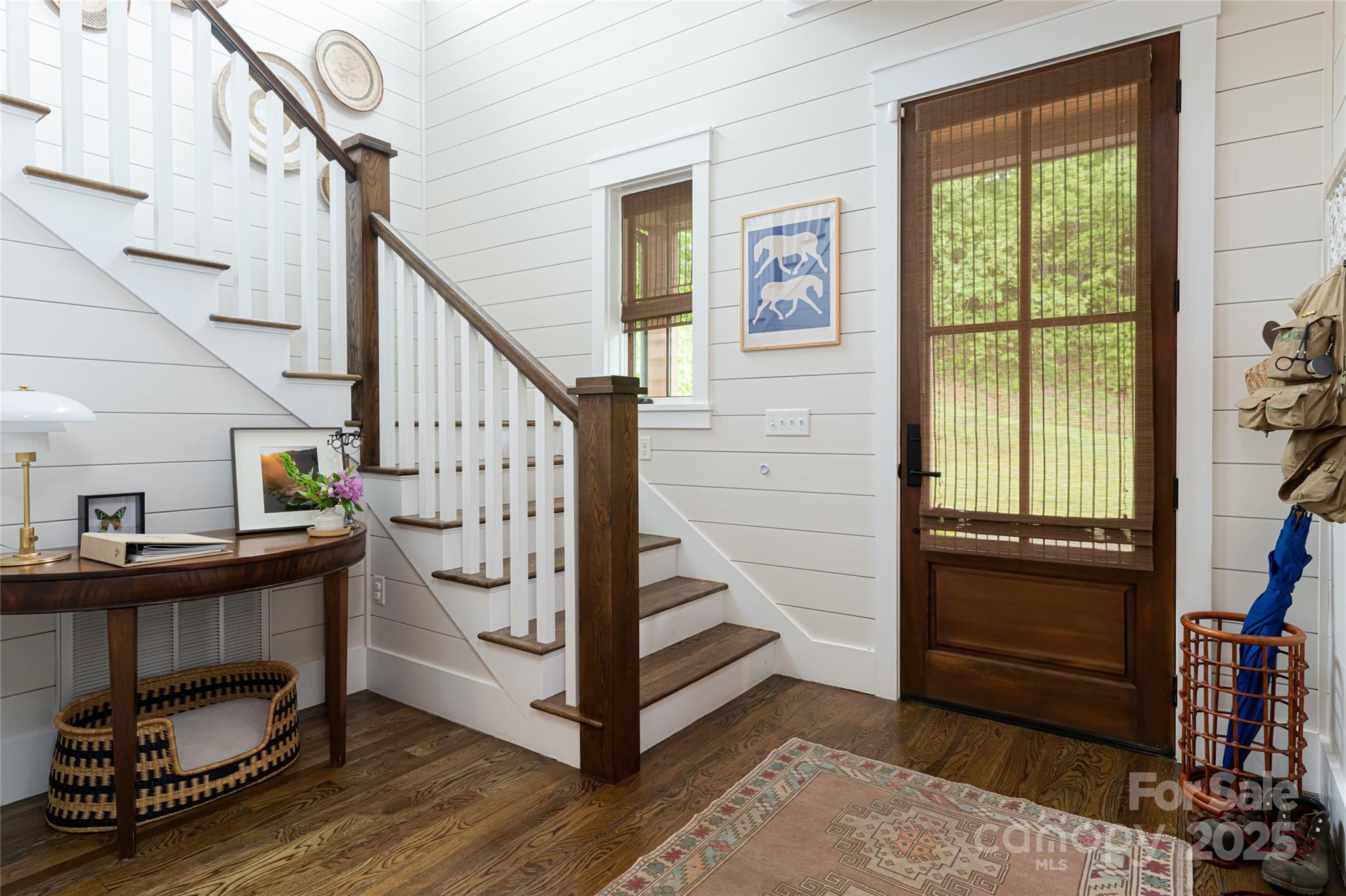 23 ( 1) Lodestone Drive, Unit 412 Sylva, NC 28779 - Photo 3 of 35 a view of entryway and hall with wooden floor
