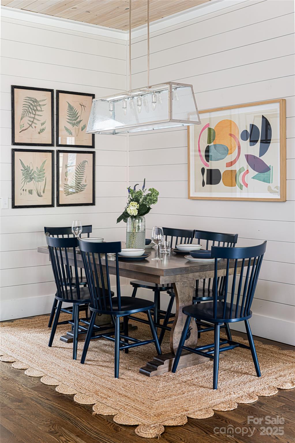 23 ( 1) Lodestone Drive, Unit 412 Sylva, NC 28779 - Photo 5 of 35 a view of a dining room with furniture window and wooden floor