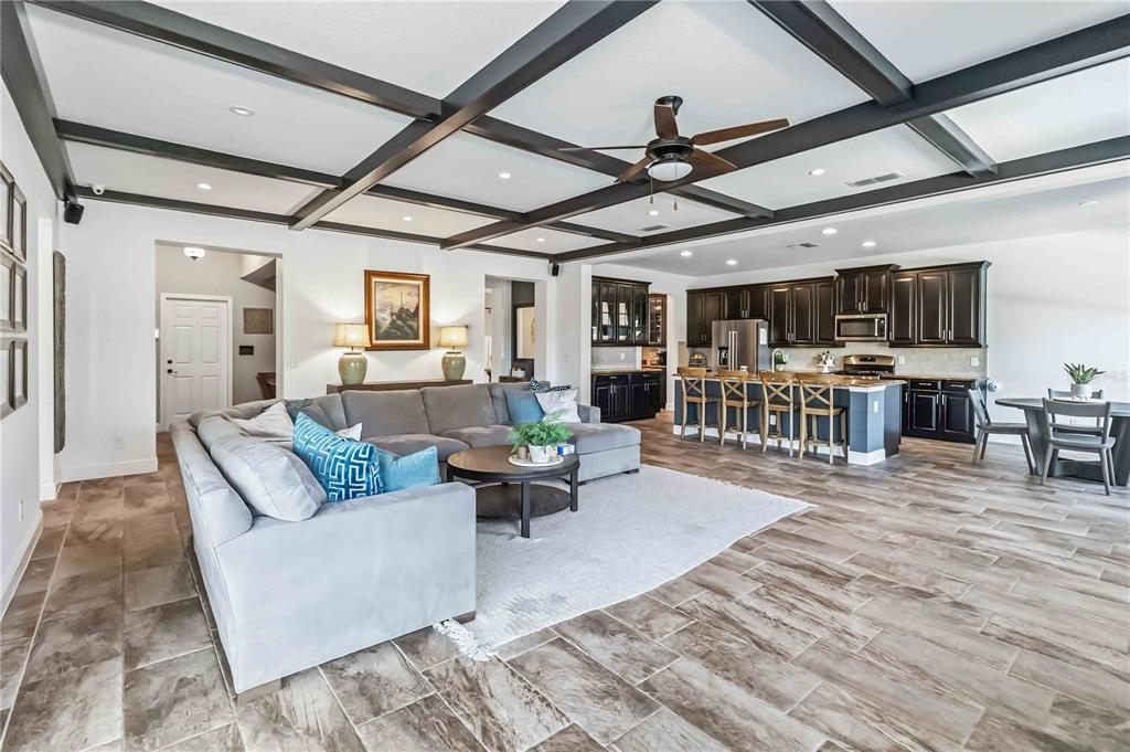 1004 Vinsetta Circle Winter Garden, FL 34787 - Photo 15 of 64 a living room with furniture and a flat screen tv