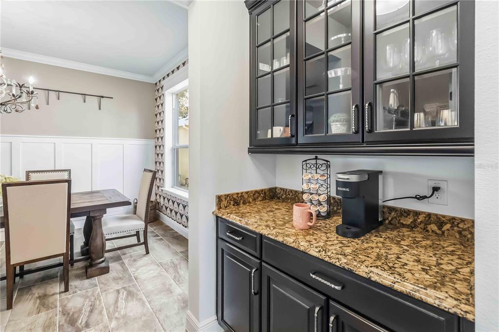 1004 Vinsetta Circle Winter Garden, FL 34787 - Photo 21 of 64 a kitchen with a sink and cabinets