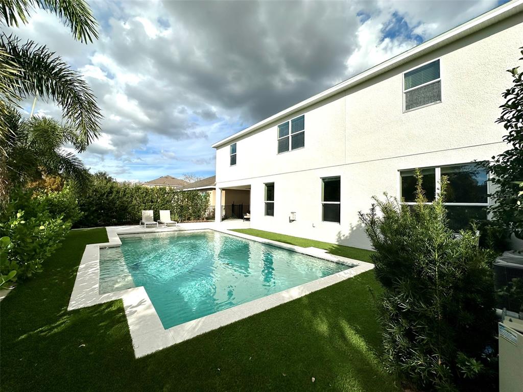 1004 Vinsetta Circle Winter Garden, FL 34787 - Photo 52 of 64 a view of a house with pool