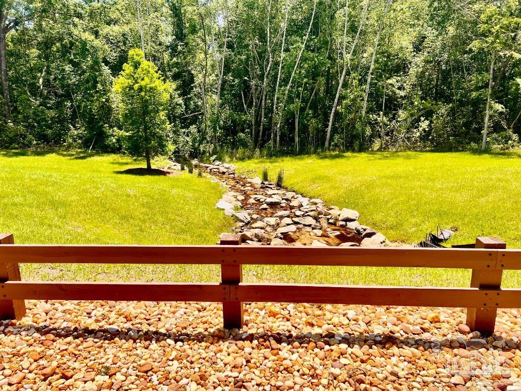 Lot 49 South Timber Lane Milton, FL 32571 - Photo 38 of 45 a view of swimming pool with an outdoor space
