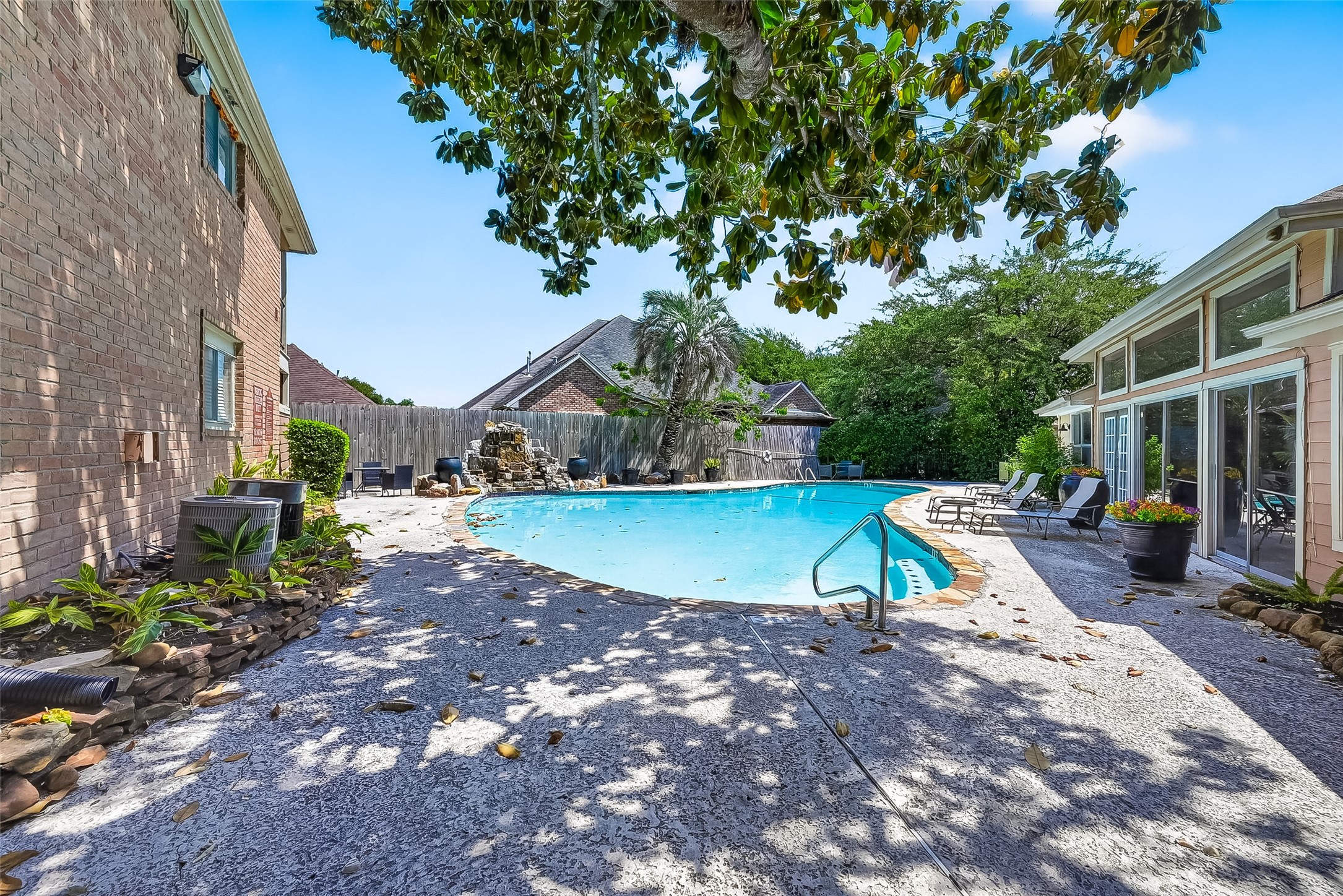 12200 Overbrook Lane, Unit 38D Houston, TX 77077 - Photo 17 of 20 a view of outdoor space yard deck and swimming pool