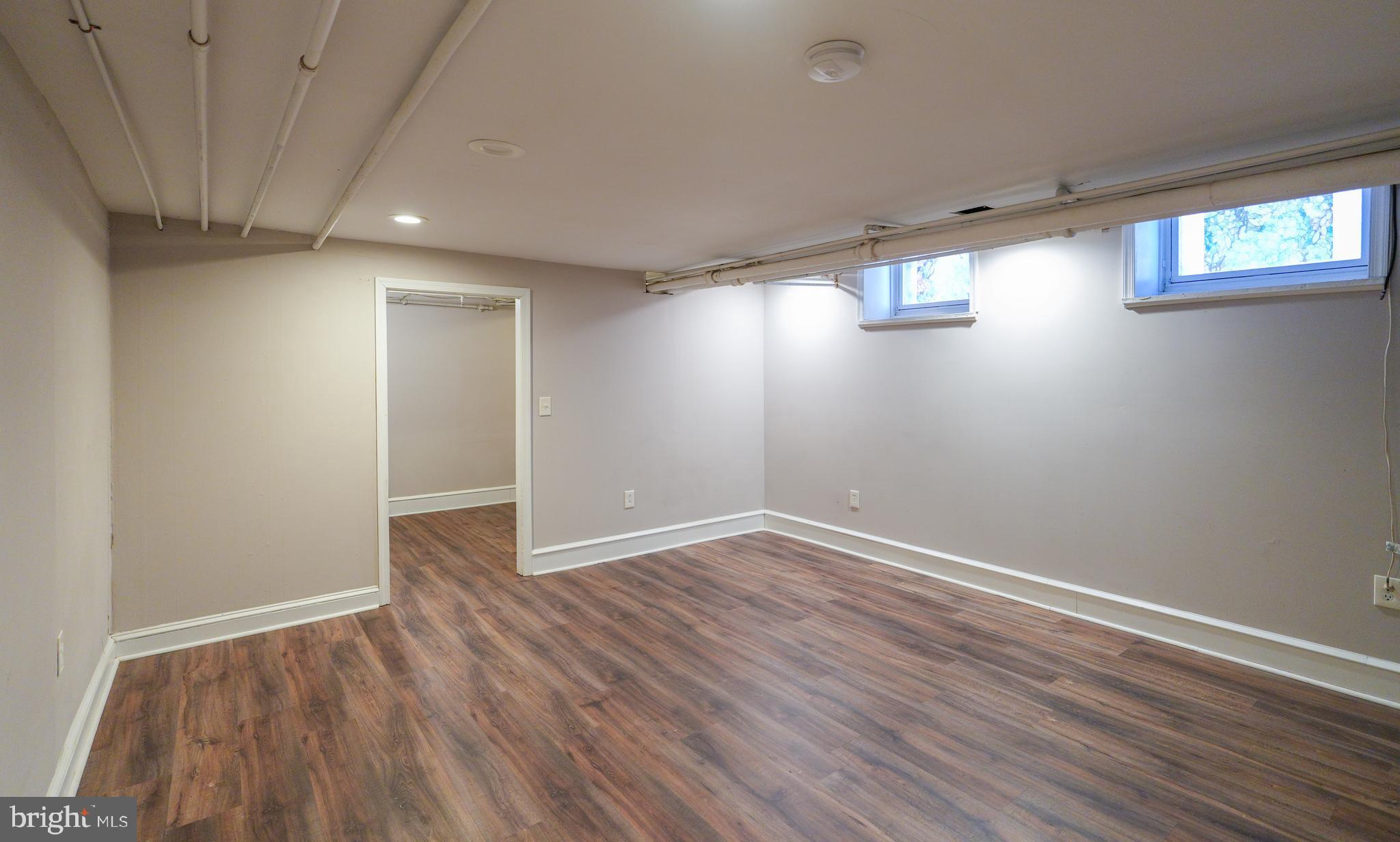 1601 Jackson Street, Unit 1 Philadelphia, PA 19145 - Photo 14 of 16 a view of empty room with wooden floor