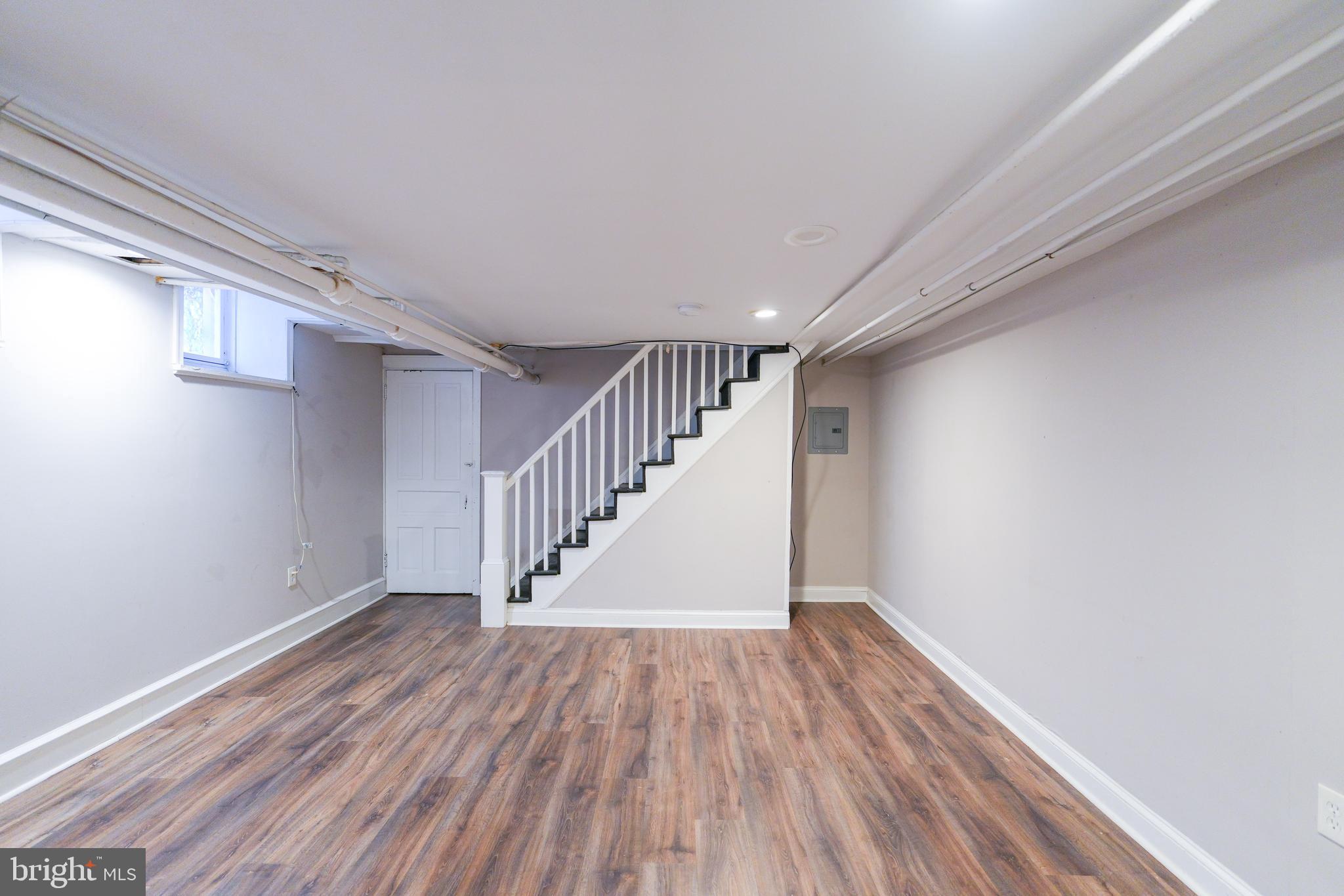 1601 Jackson Street, Unit 1 Philadelphia, PA 19145 - Photo 15 of 16 a view of entryway with wooden floor