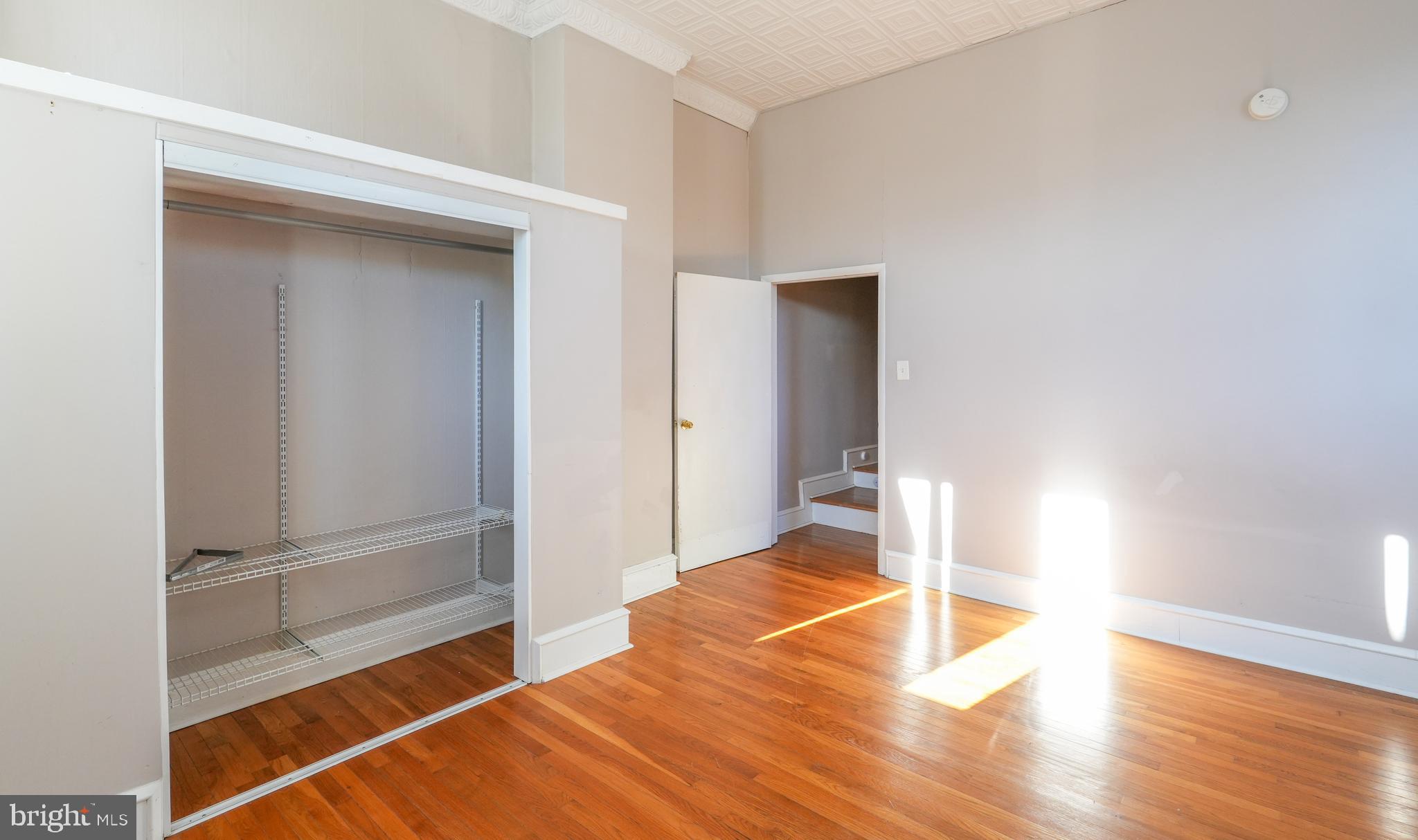 1601 Jackson Street, Unit 1 Philadelphia, PA 19145 - Photo 9 of 16 a view of empty room with wooden floor