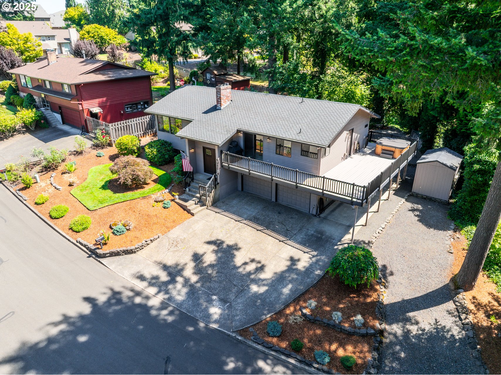 9420 Southeast Carnaby Way Happy Valley, OR 97086 - Photo 1 of 43 an aerial view of a house with yard and outdoor seating