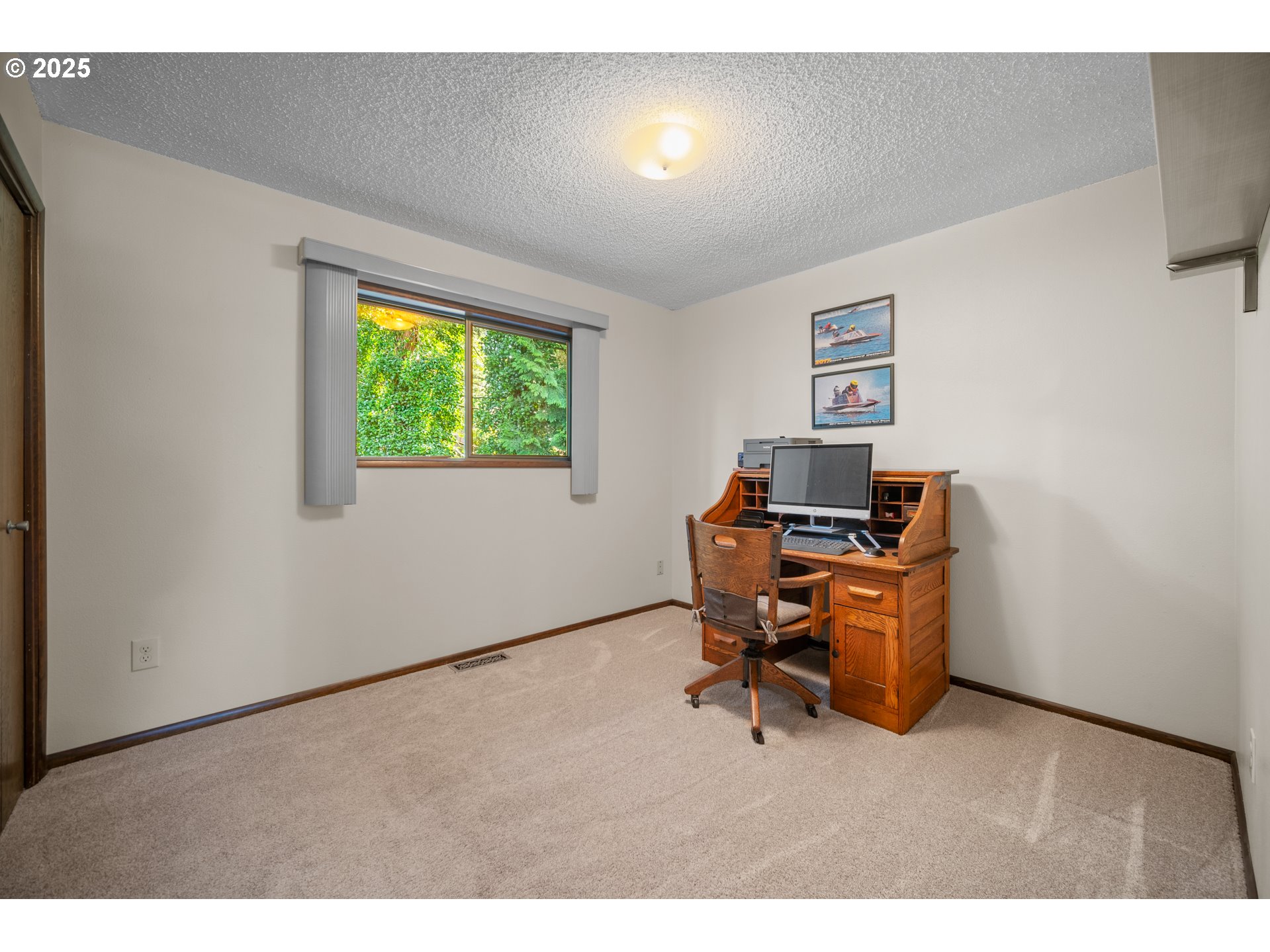 9420 Southeast Carnaby Way Happy Valley, OR 97086 - Photo 14 of 43 a workspace with furniture and a window