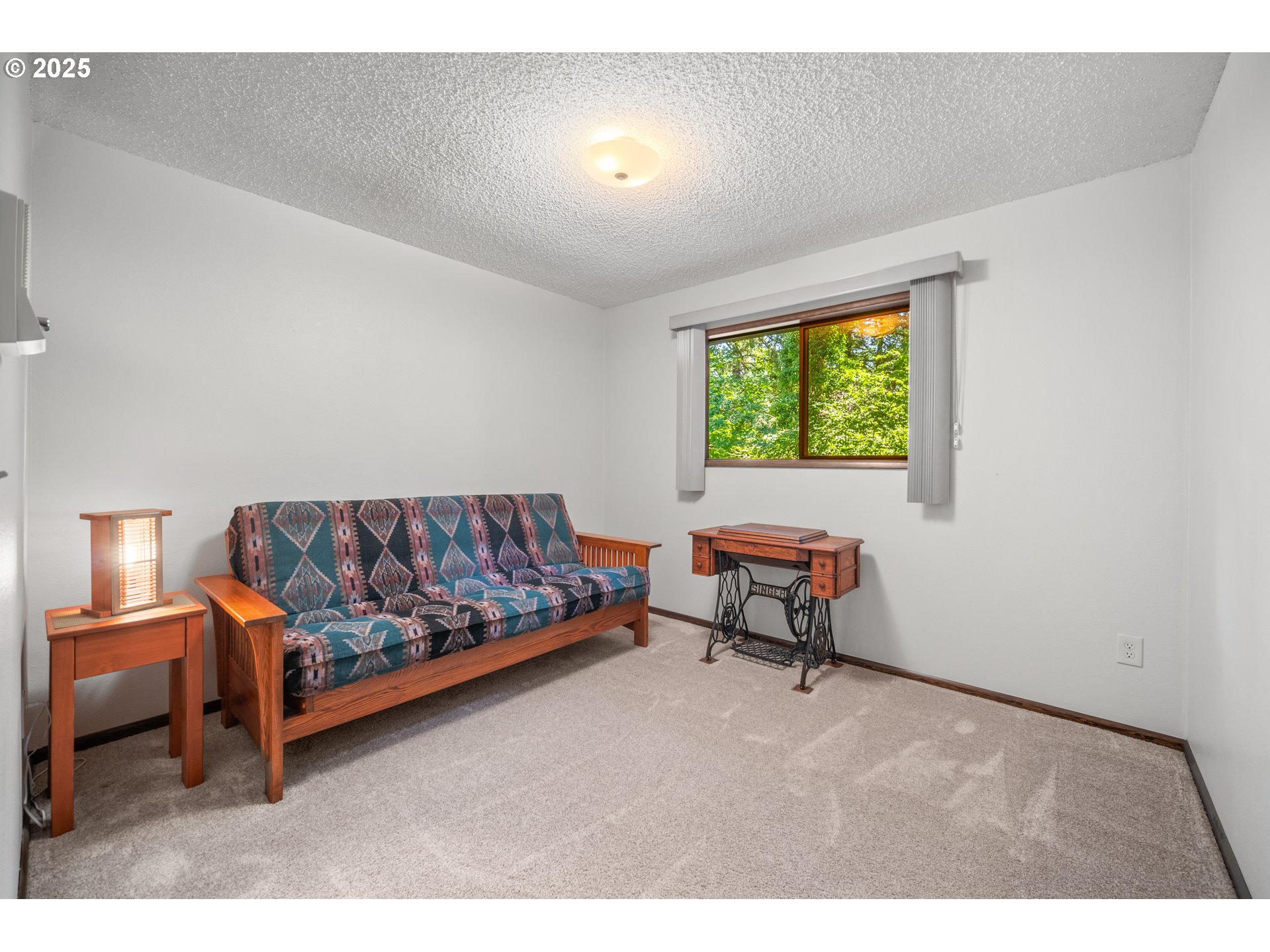 9420 Southeast Carnaby Way Happy Valley, OR 97086 - Photo 15 of 43 a living room with furniture and a window