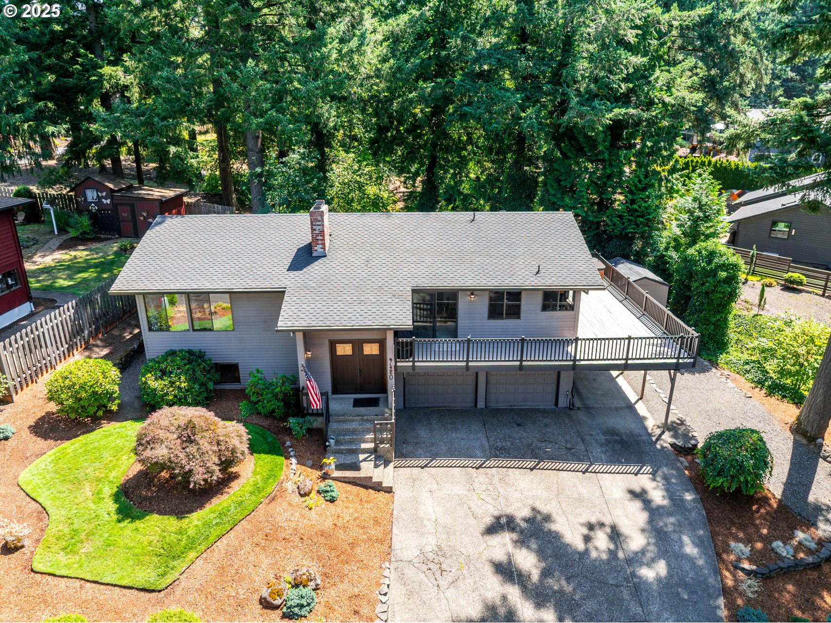 9420 Southeast Carnaby Way Happy Valley, OR 97086 - Photo 2 of 43 a aerial view of a house with a yard patio and furniture