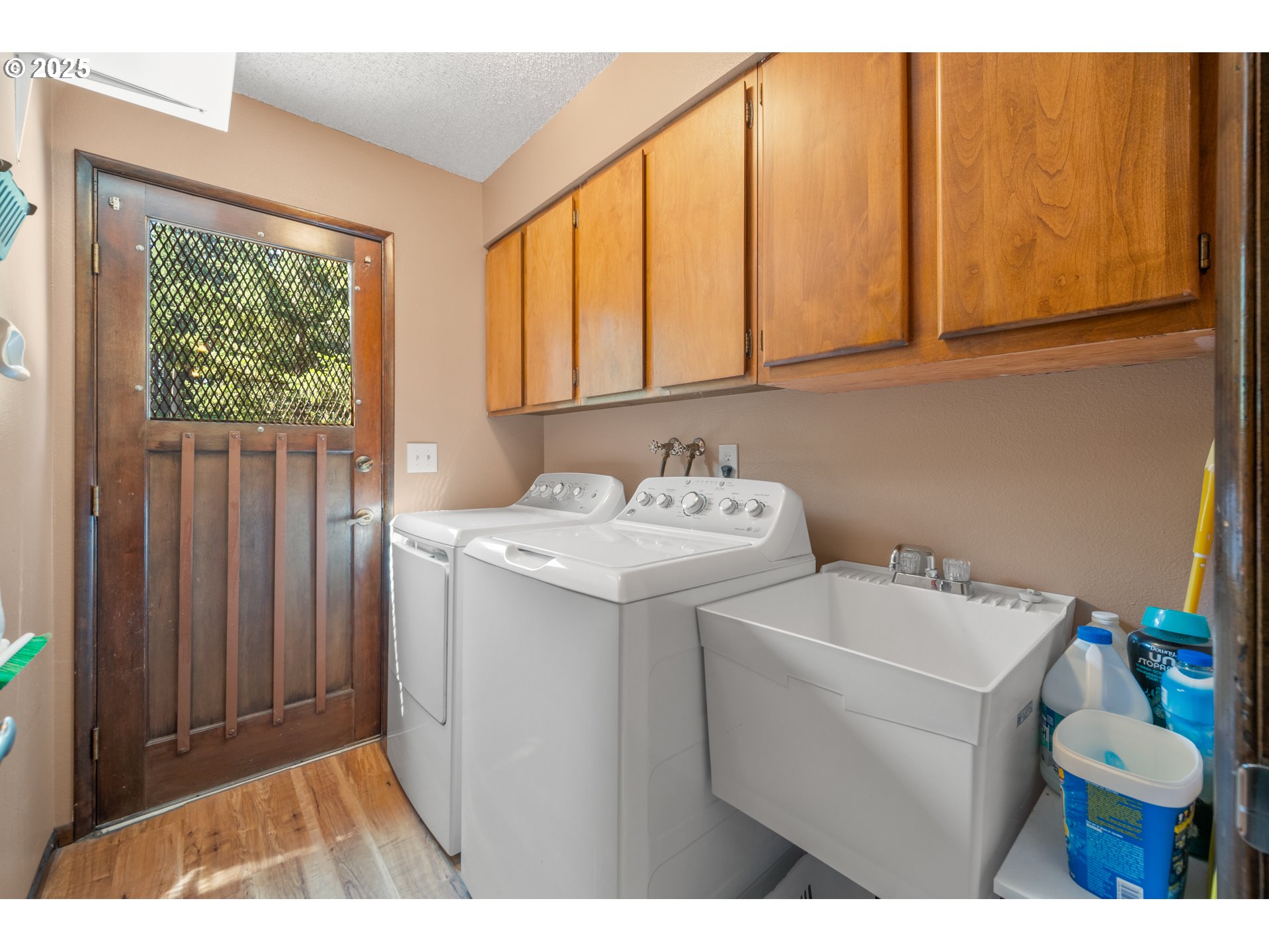 9420 Southeast Carnaby Way Happy Valley, OR 97086 - Photo 21 of 43 a utility room with dryer and washer