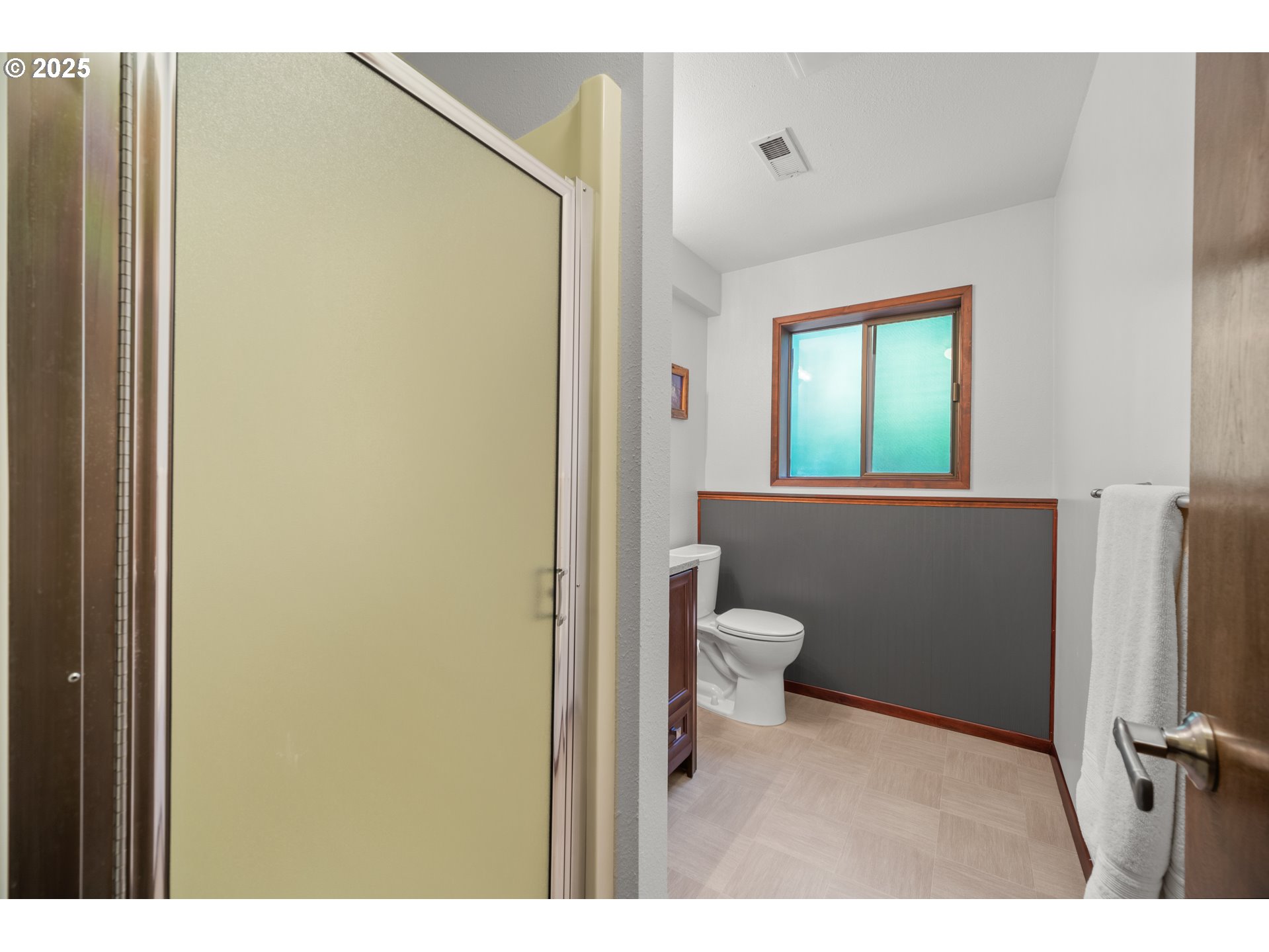 9420 Southeast Carnaby Way Happy Valley, OR 97086 - Photo 27 of 43 a bathroom with a toilet
