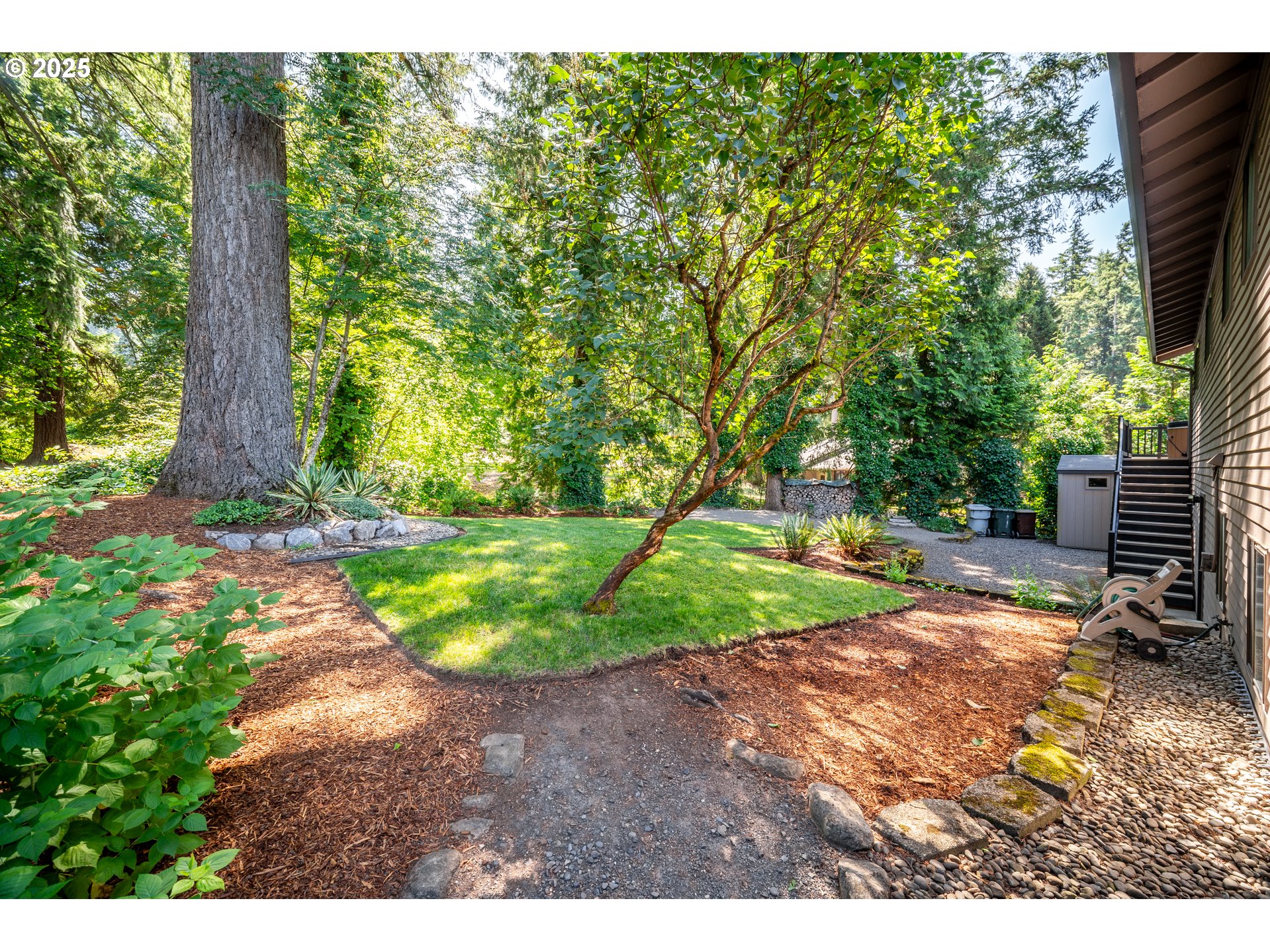 9420 Southeast Carnaby Way Happy Valley, OR 97086 - Photo 34 of 43 a view of backyard with green space