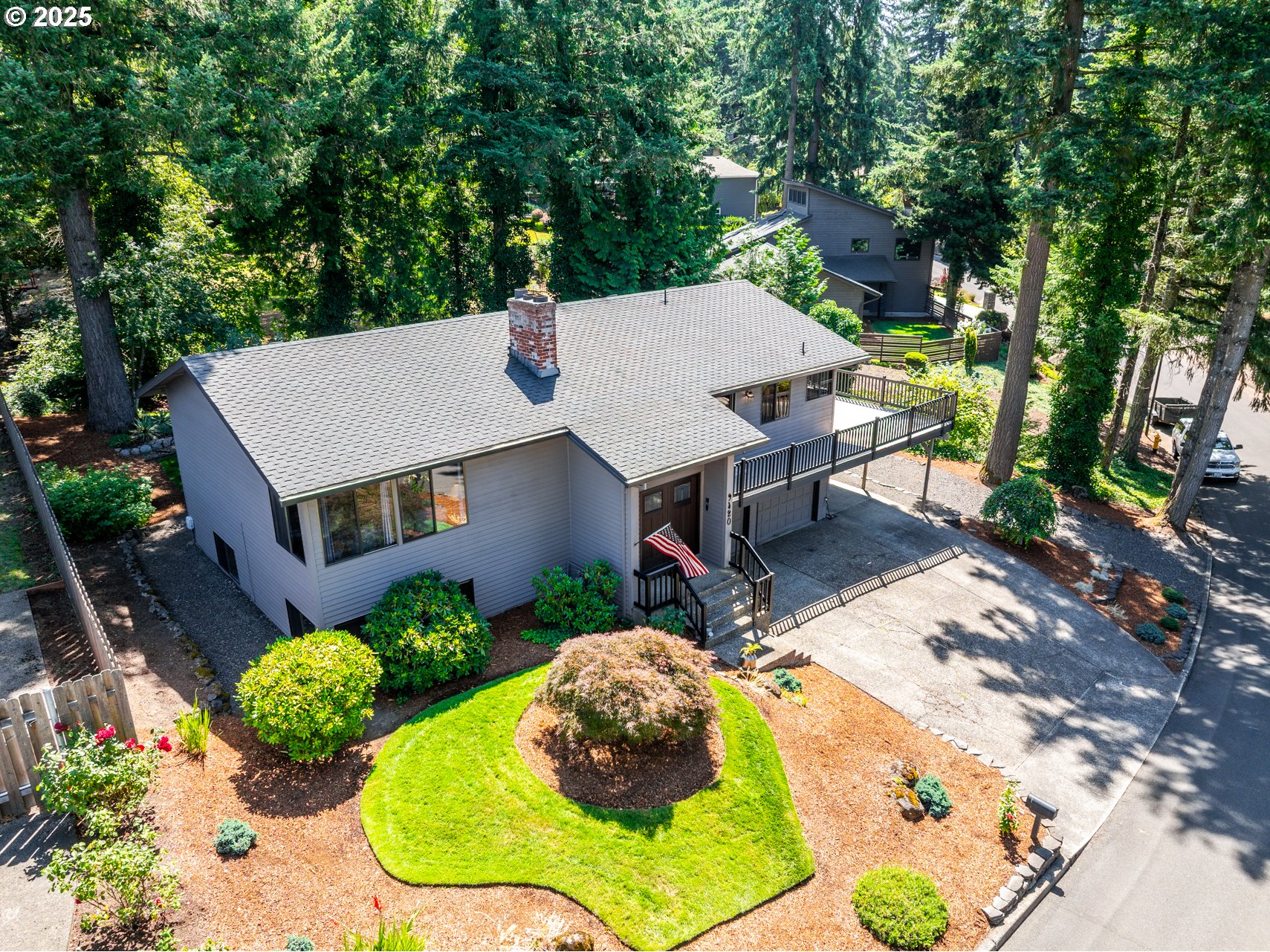 9420 Southeast Carnaby Way Happy Valley, OR 97086 - Photo 35 of 43 an aerial view of a house with swimming pool garden and patio