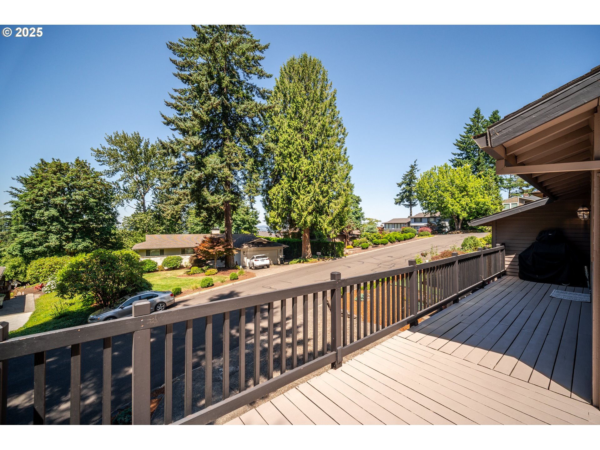 9420 Southeast Carnaby Way Happy Valley, OR 97086 - Photo 38 of 43 a balcony with wooden floor