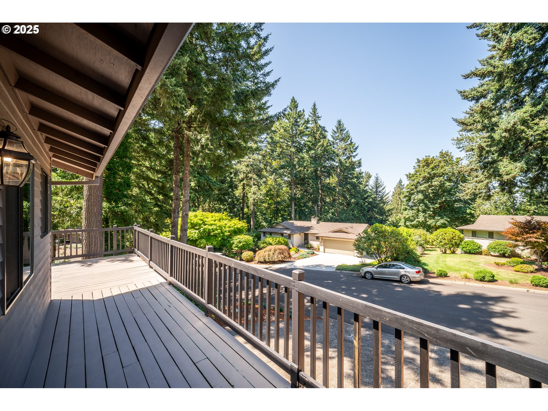 9420 Southeast Carnaby Way Happy Valley, OR 97086 - Photo 39 of 43 a view of balcony with wooden floor and fence