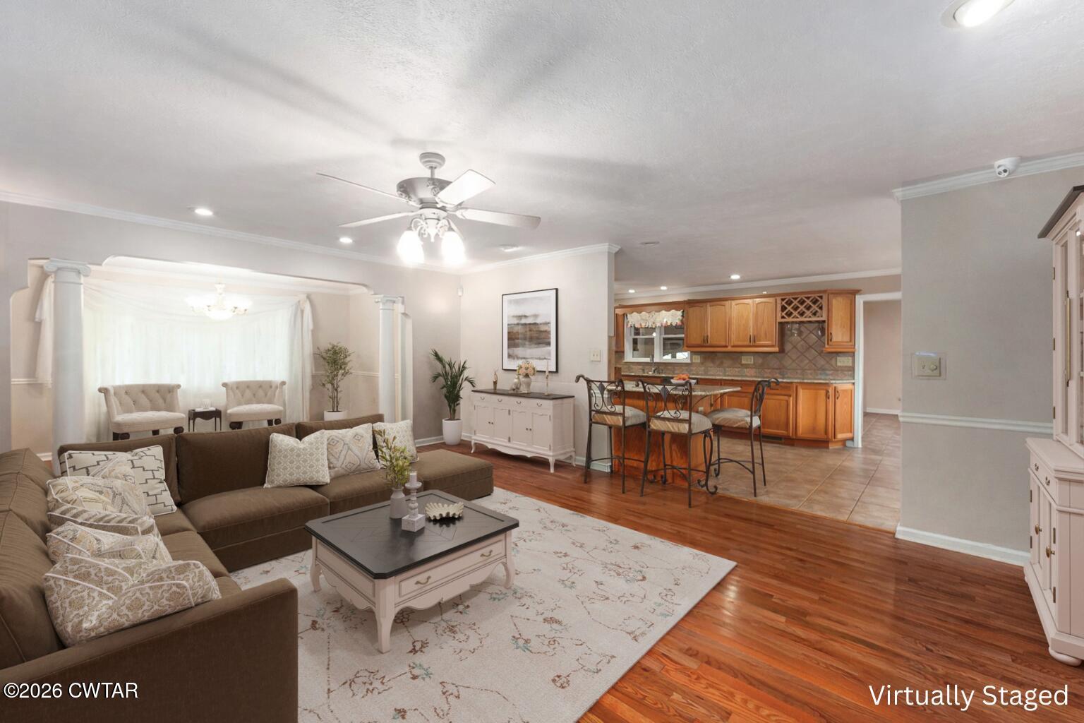 812 Pipkin Road Jackson, TN 38305 - Photo 13 of 62 a living room with furniture and wooden floor