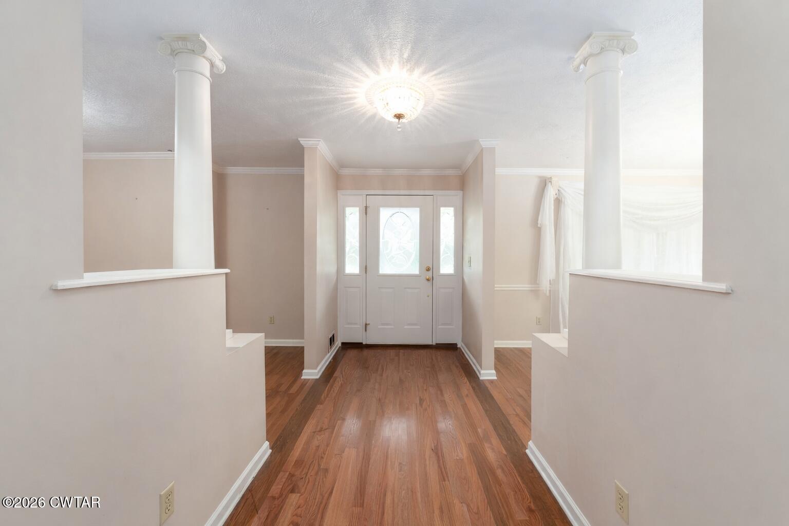 812 Pipkin Road Jackson, TN 38305 - Photo 24 of 62 a view of a room with wooden floor and window