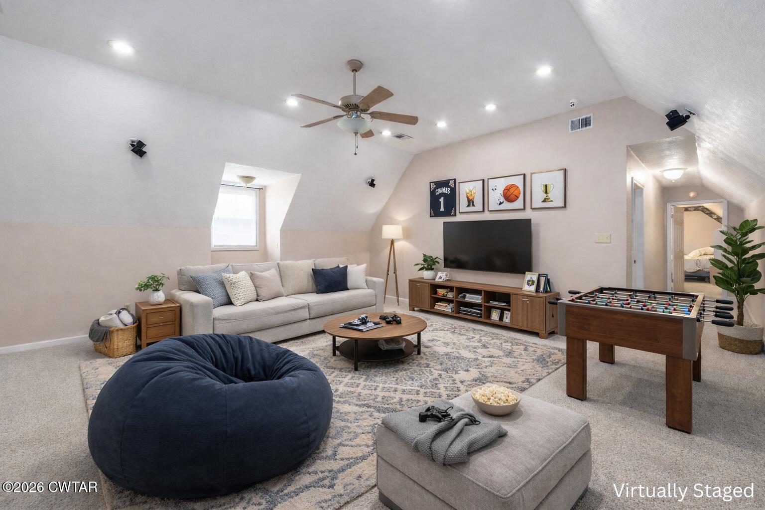 812 Pipkin Road Jackson, TN 38305 - Photo 36 of 62 a living room with furniture and a flat screen tv