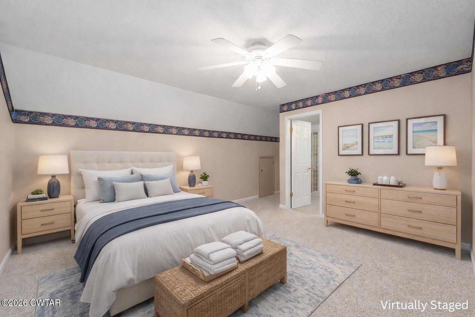 812 Pipkin Road Jackson, TN 38305 - Photo 39 of 62 a bedroom with a bed and a chandelier