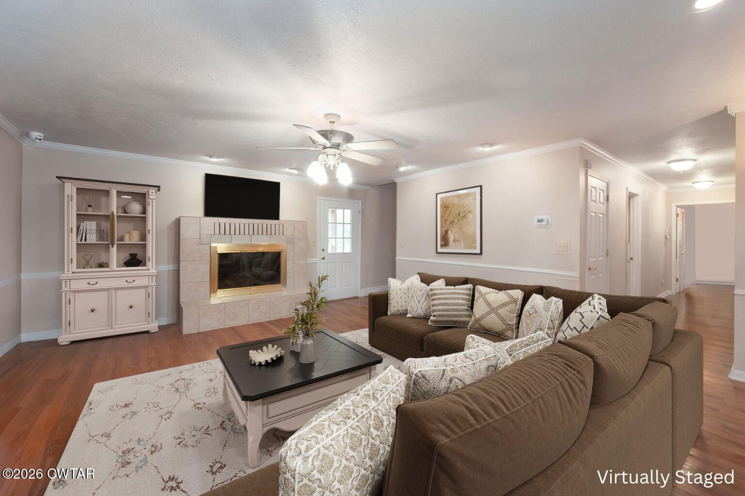 812 Pipkin Road Jackson, TN 38305 - Photo 4 of 62 a bedroom with furniture and a flat screen tv