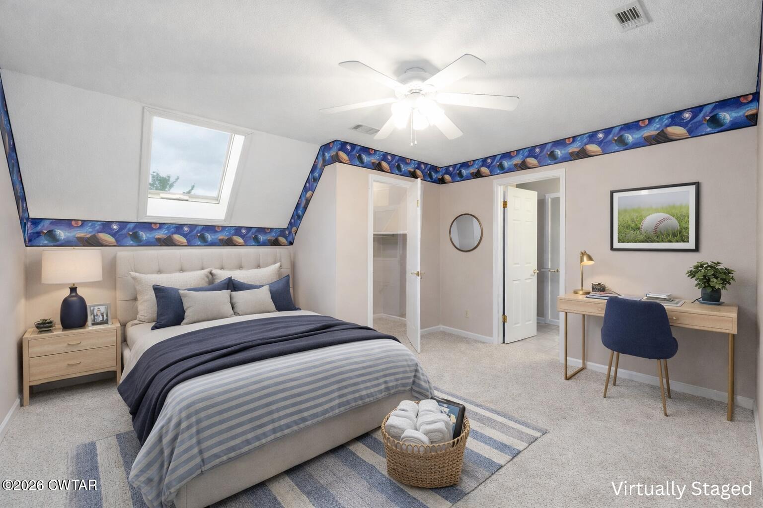 812 Pipkin Road Jackson, TN 38305 - Photo 45 of 62 a bedroom with a bed and a chandelier