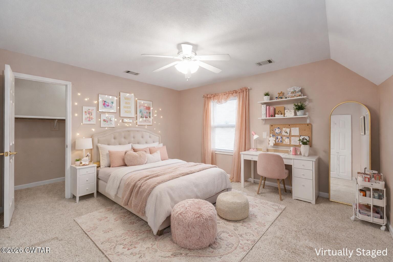 812 Pipkin Road Jackson, TN 38305 - Photo 47 of 62 a bedroom with a bed and a chandelier